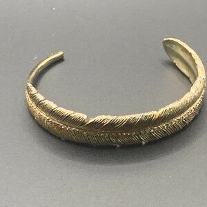 T & N Gold Toned Feathered Cuff Bracelet with Crystals